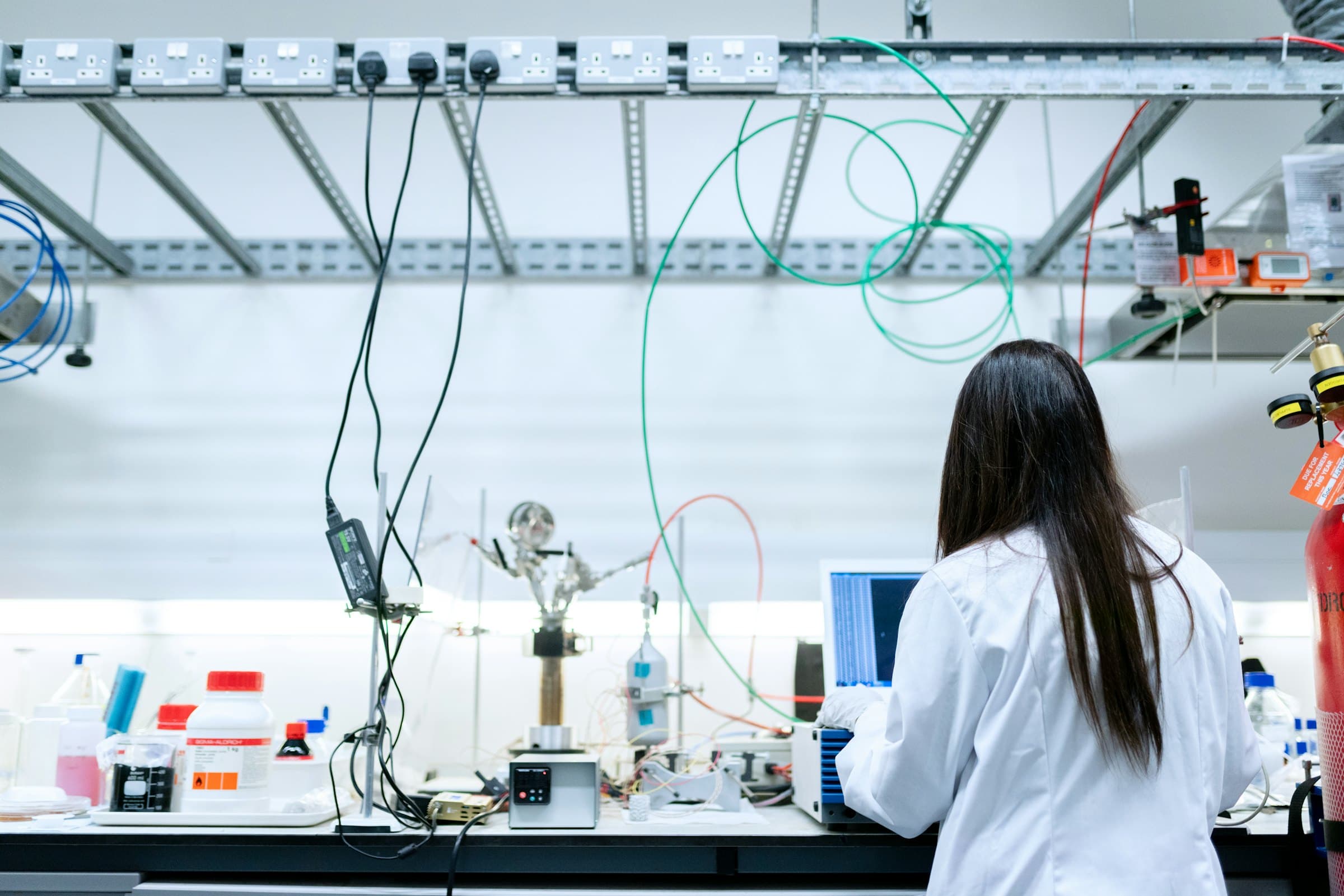 A researcher working at a laboratory bench